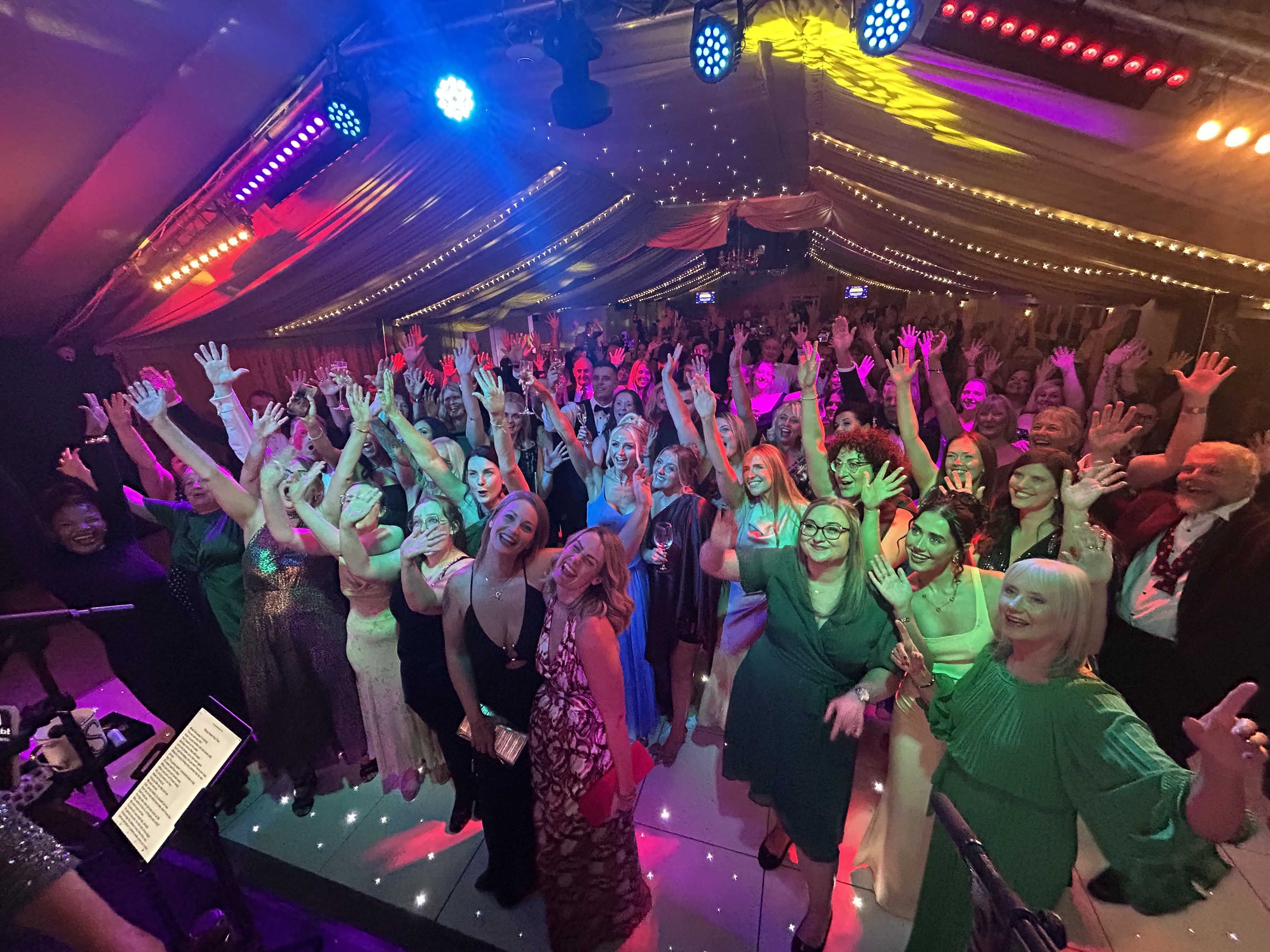 Group picture on the dancefloor at the ball