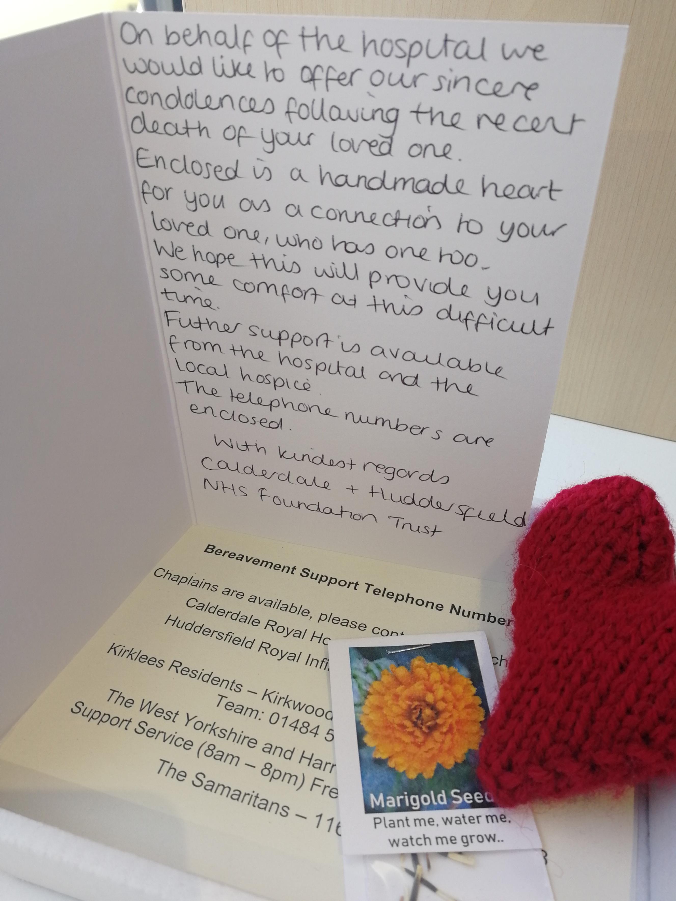 Bereavement Support box which includes a card, knitted heart and flower seeds.