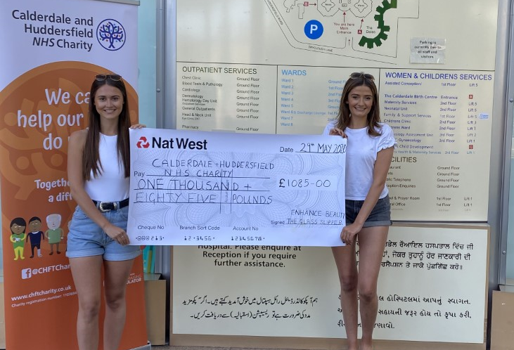 Fundraisers doing a cheque presentation
